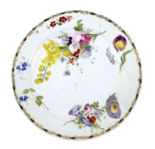 A Swansea porcelain dish, early 19th century, decorated in enamels with sprays of flowers, scrolling