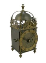 A Charles ll period brass lantern clock case, by Andrew Prime, London, with a later chain driven