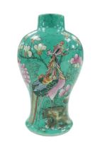 A 20th century Japanese baluster form vase, decorated with Phoenixes and cherry blossom upon a