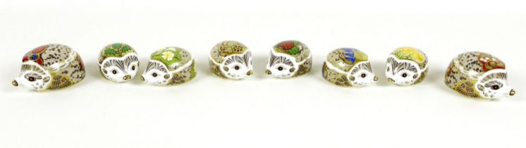 A group of eight small Royal Crown Derby paperweights, all modelled as hedgehogs, comprising '