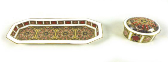 A Royal Crown Derby china oval lidded box and pen tray, decorated in the Imari pattern. (2) Both
