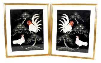 A pair of Asian embroidered panels, depicting exotic birds on a black ground, 49 by 39cm, each
