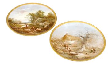 A pair of large 19th century hand painted decorative porcelain wall plates / plaques by William