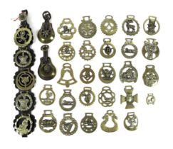 A collection of thirty three horse brasses. (33)
