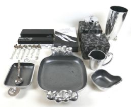 A collection of Carrol Boyes designed metal table and serving ware, including bowls, dishes, jug,