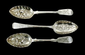 A group of three silver berry spoons, comprising a pair, James and Josiah Williams, Exeter 1874,