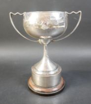 A George VI silver twin handled trophy cup, with presentation inscription: ‘Presented to Chatteris