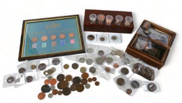 A small collection of coins, including Britain's Royal Lineage, various copper, brass and some