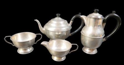 A George V four pieces silver bachelor's tea set, comprising teapot with bakelite finial and handle,