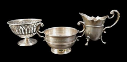 Three pieces of silver ware a cream jug, a sweetmeat dish and a presentation cup total 204 grams,