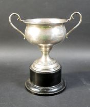 A George V silver twin handled cup, without inscription, rubbed maker’s marks, Birmingham 1928, 10.