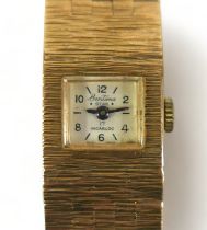 A Bentima Star 9ct gold lady's wristwatch, circa 1970's, small rectangular silvered dial set in a