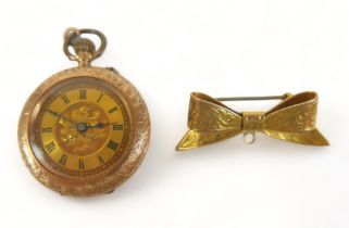 A Continental 14k yellow gold lady's pocket watch, open faced, key wind, 31mm, 22.4g gross, together