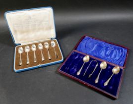 A boxed set of silver 1935 jubilee British hallmarked rats tail tea spoon from London to