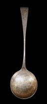 A George III Late 18th century Scottish provincial silver soup ladle, with makers marks I.S and ABD.