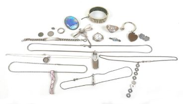 A collection of silver and white metal jewellery, including a Chinese 30 gram weight, and a silver