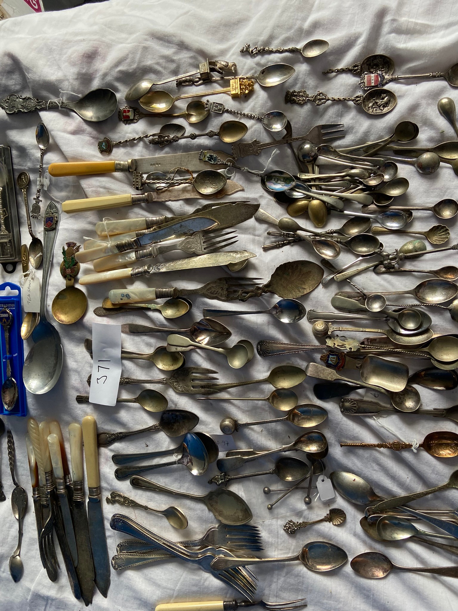 Collection of commemorative salt and caddy spoons and others