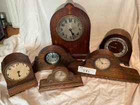 Collection of wood cased mantle clocks