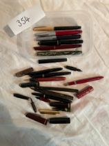Collection of fountain pen parts