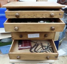 A pine 6 drawer collectors cabinet, table top cabinet and some tools