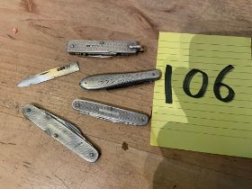 Two silver hallmarked pocket knives, silver blade, and two other knives.