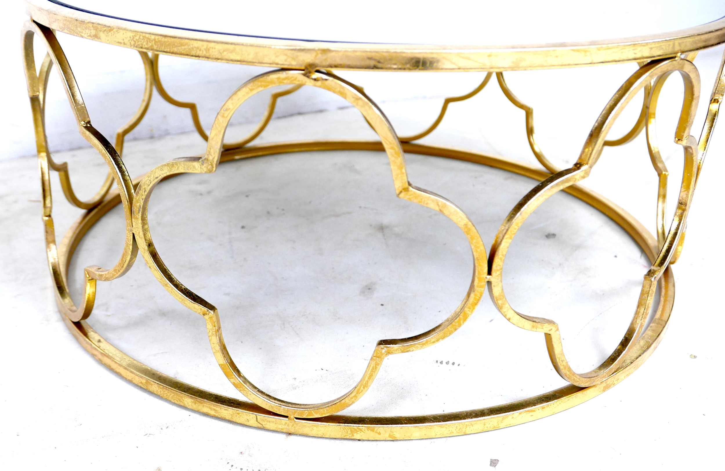 A modern mirror topped coffee table, the circular surface on a brass effect open frame base formed - Image 5 of 5
