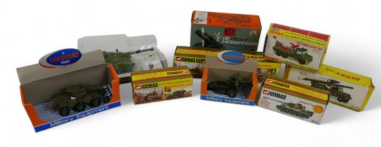 A collection of nine die cast military vehicles
