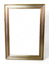 A rectangular gilt bevelled mirror, with silver coloured band to frame.