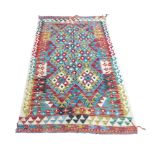 Multicoloured geometric 100% hand knotted woollen carpet rug, 166 by 107cm.