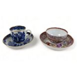 A first period Worcester blue and white tea cup and saucer and a famille rose tea bowl and saucer.