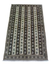 A Mahal rug, with repeat striped pattern, 256 by 160cm.