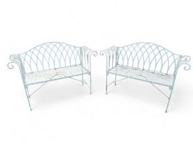 Two French grey/green painted metal garden benches with roll arms. (2)