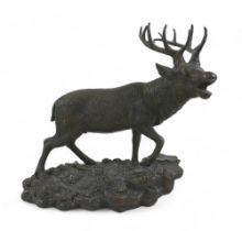 After Christopher Fratin, (French 1801-1864): a brinze sculpture, modelled as a braying stag, on