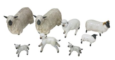 Eight Beswick figurines, including two Wensleydale sheep, 10.5cm high, as well as six other sheep