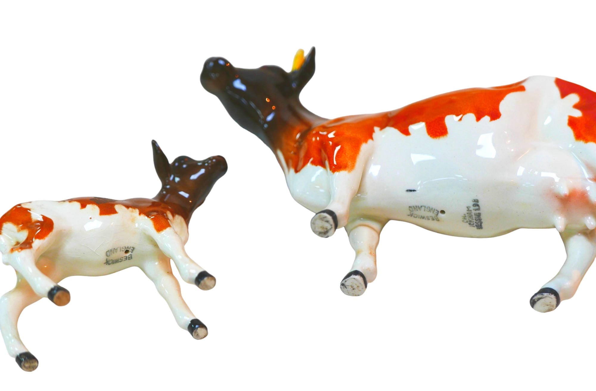 Two Beswick figurines of cattle, comprising a Ayreshire cow, 'Ch. Ickham Bessie', 11.5cm high, a - Image 2 of 3