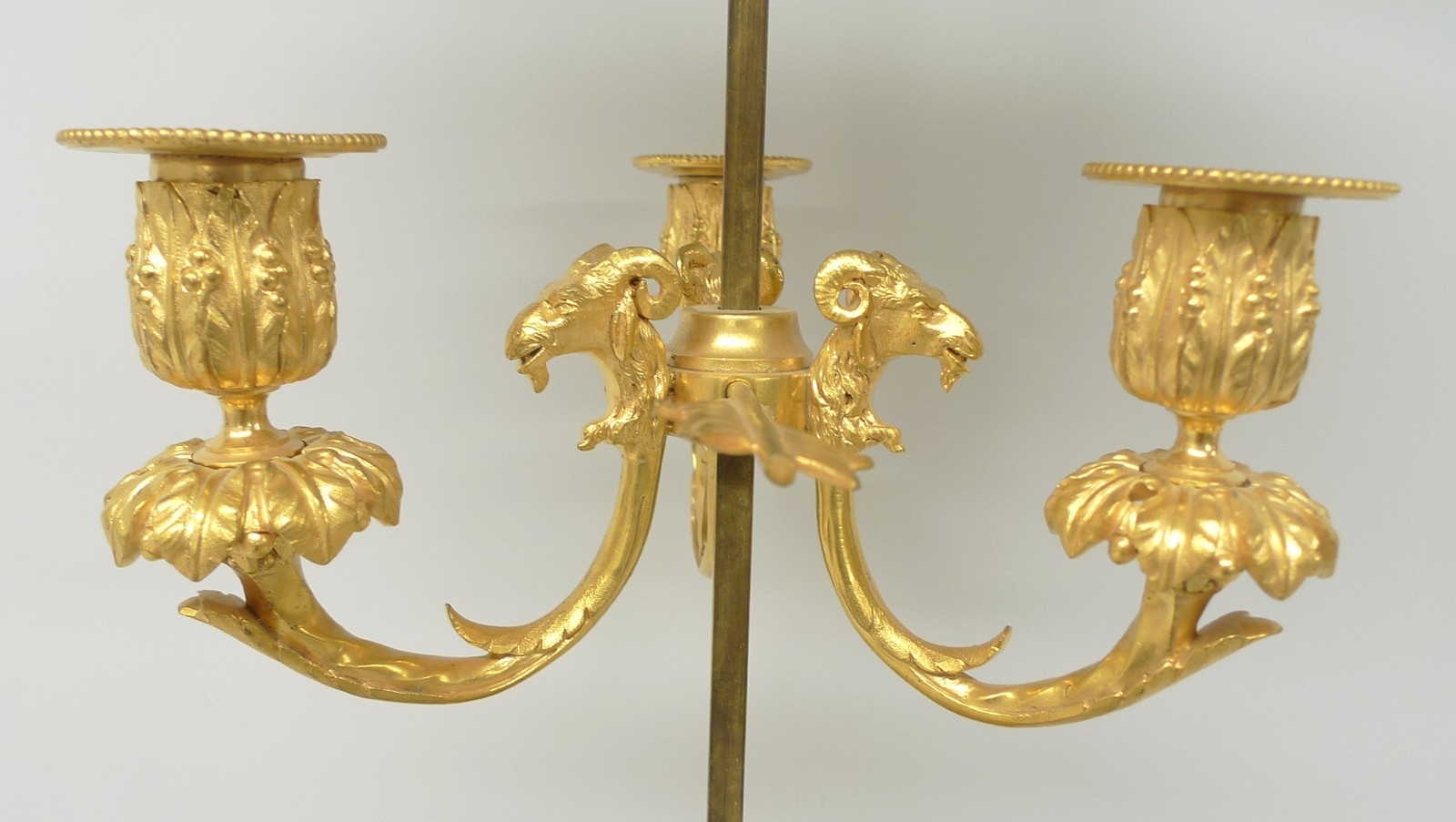 An early 20th century French ormolu bouillotte lamp, the three branches with rams head terminals - Image 8 of 22