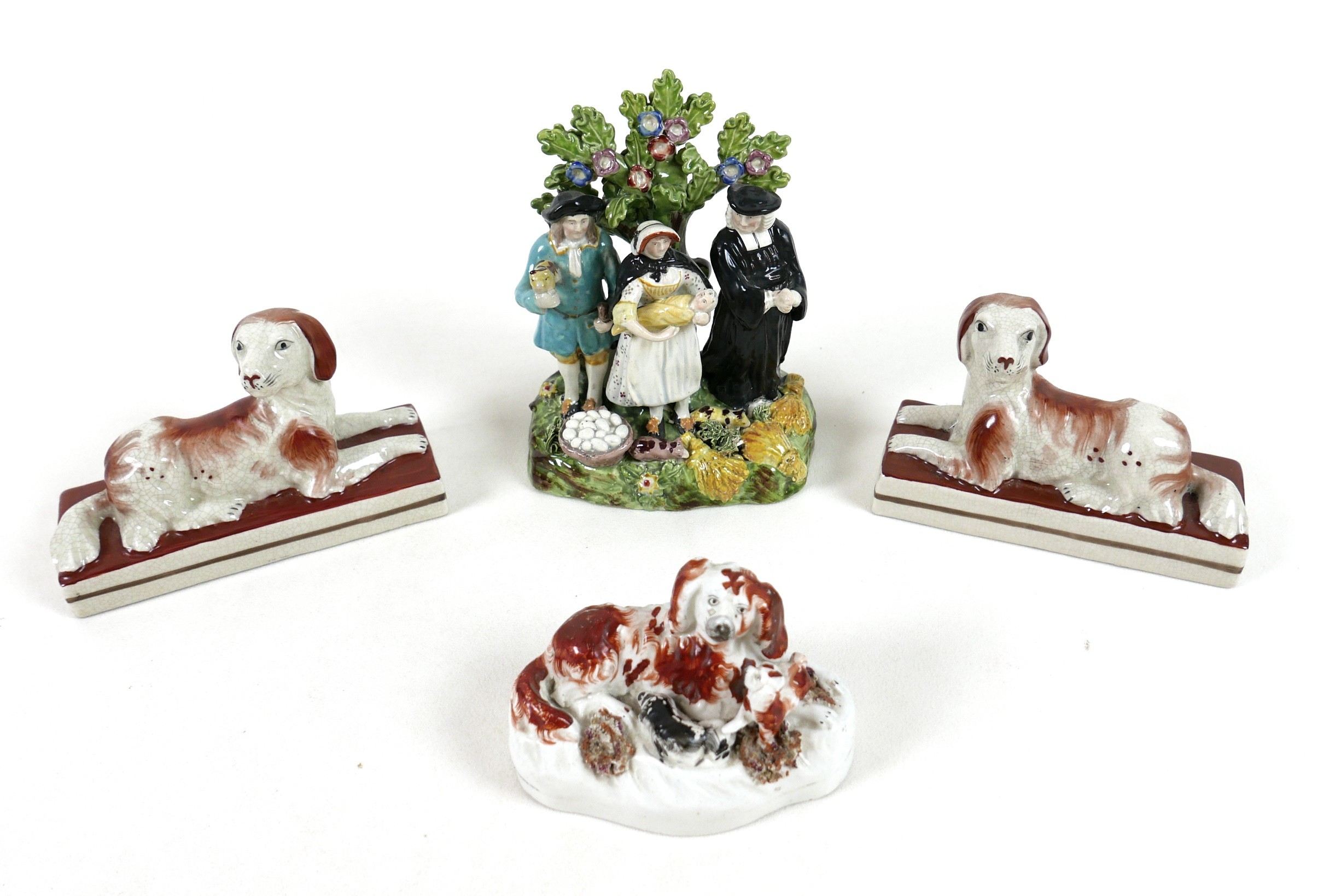 A group of Staffordshire ceramics, including 19th century Staffordshire pearlware figure group '