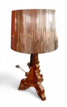 A Kartell Bourgie lamp, model designed by F. Laviani, with gold coloured shade.