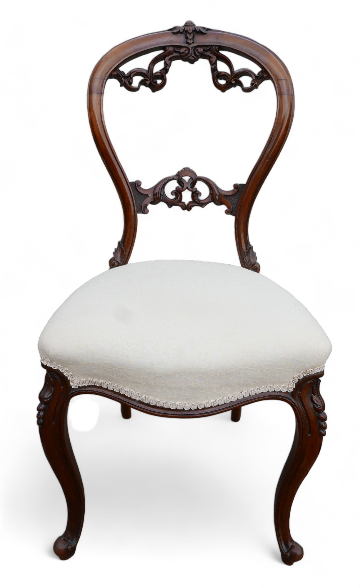 A set of six Victorian dining chairs, the balloon back and middle rail carved with foliage - Image 3 of 12