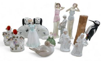 A group of figurines, including Royal Doulton, 'HN4196', 'HN4197', 'HN4308' and 'HN2340'; a Lladro