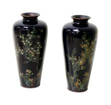 A pair of Meiji cloisonne vases, decorated blossoming branches and birds, a/f, 19cm high. (2)