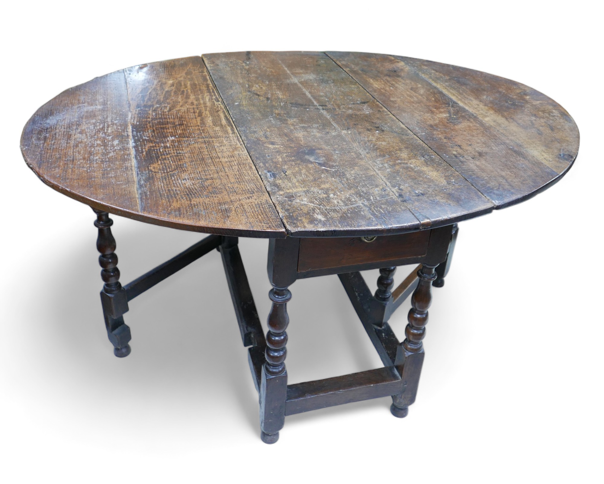 An 18th century oak drop leaf table, with oval top, two gate legs with turned supports and - Image 2 of 9