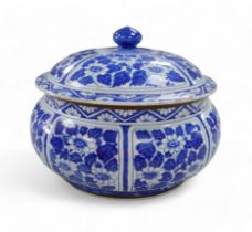 A modern porcelain tureen and cover, decorated in under glazed blue and white, with flowers and