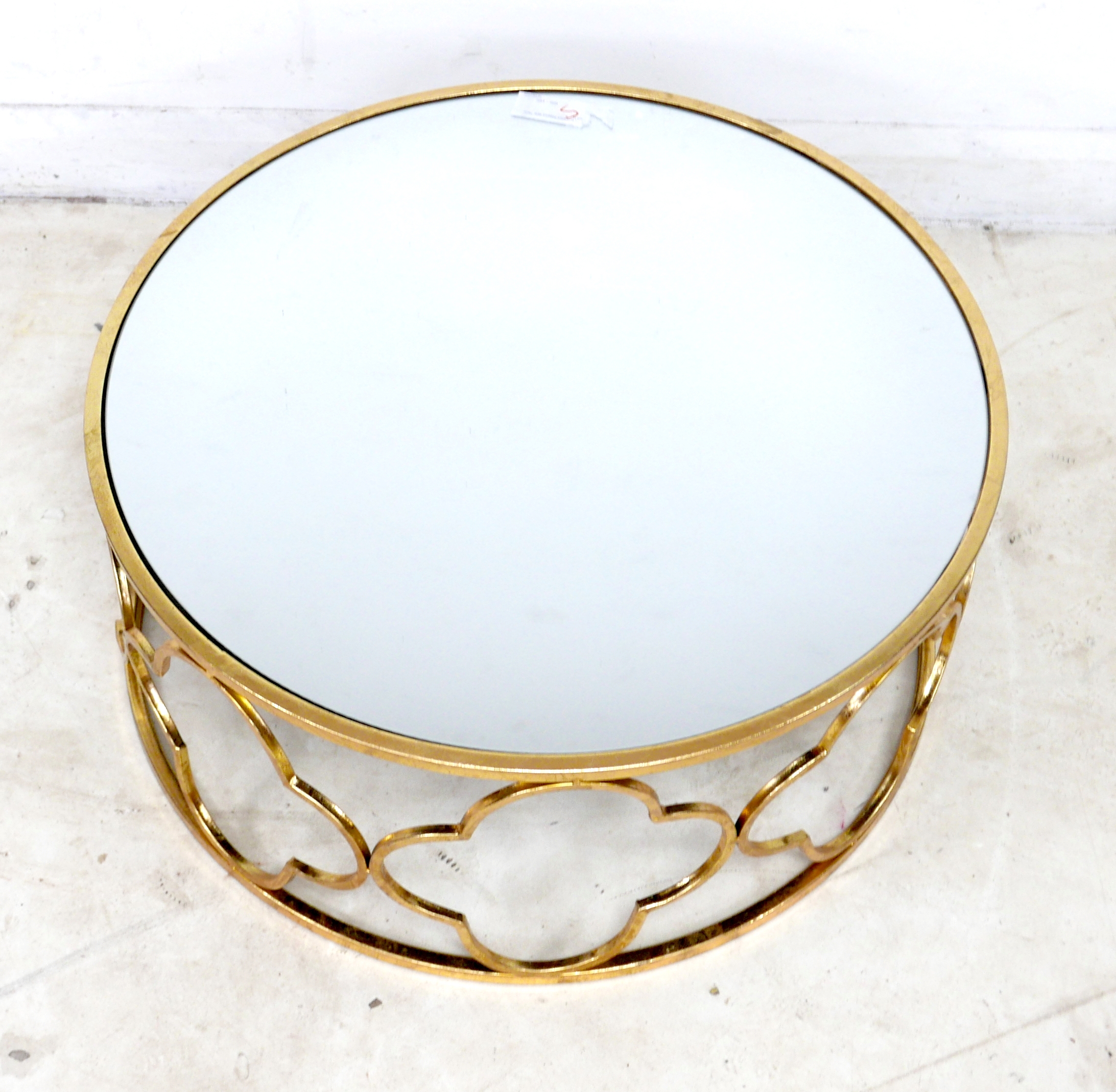 A modern mirror topped coffee table, the circular surface on a brass effect open frame base formed - Image 2 of 5