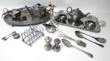 Two pieces of silver, a pepper pot (with plastic fittings) and a napkin ring, together with a