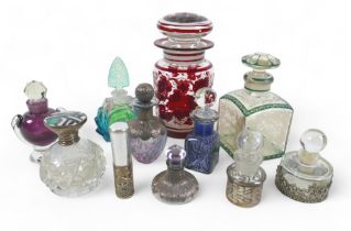 A collection of ten scent bottles and lidded bottle, tallest 16cm. (11) The two square bottles