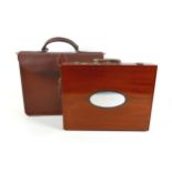 An unusual bespoke mahogany briefcase, silver mounted fittings, horn handle, oval plaque with