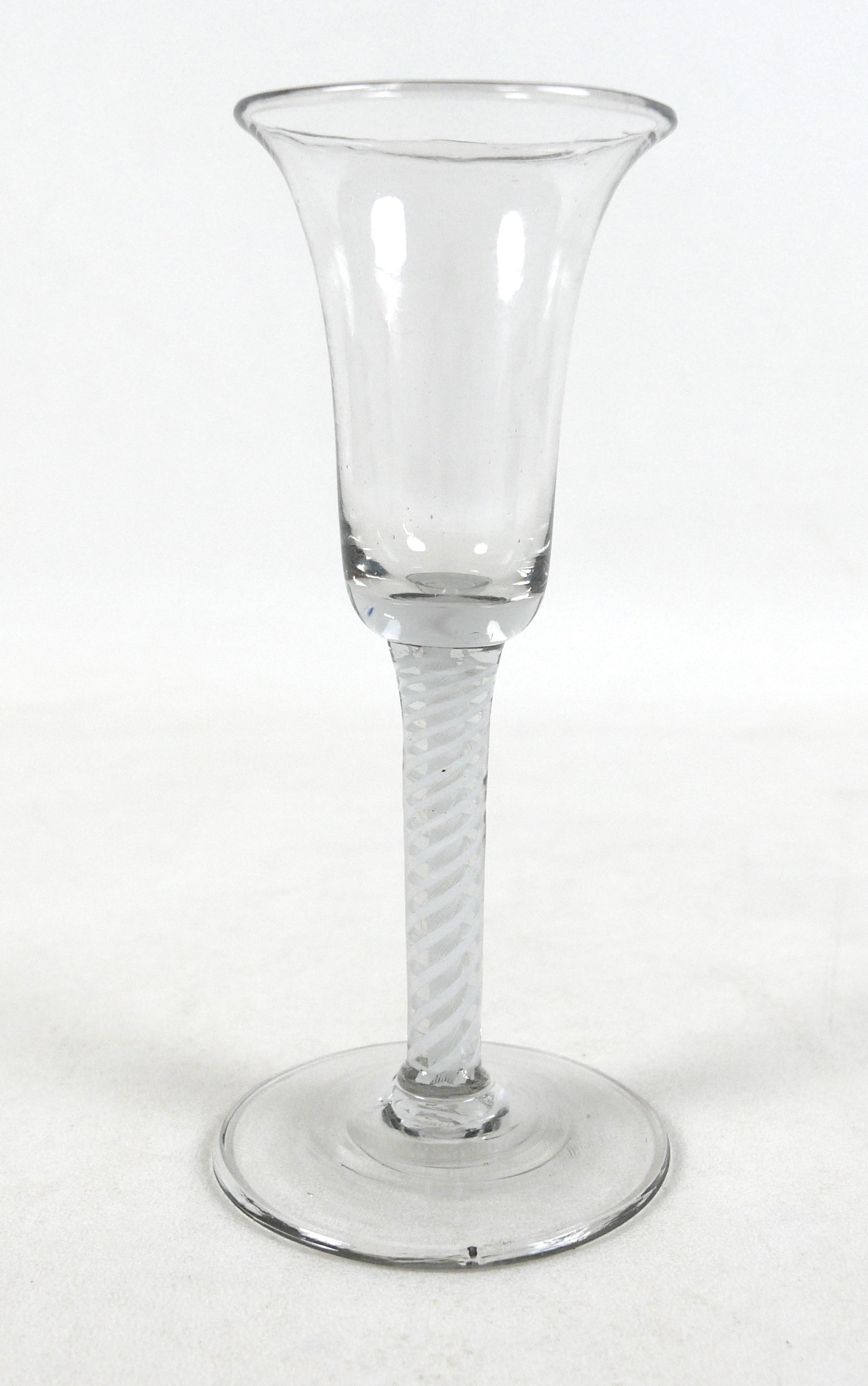 An 18th century air twist cordial glass 16cm In good condition.