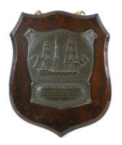 Military / Maritime Interest: an Edward VII commemorative metal plaque on wooden shield, shaped