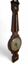 A Regency mother of pearl inlaid rosewood barometer with hydrometer above thermometer and dial.